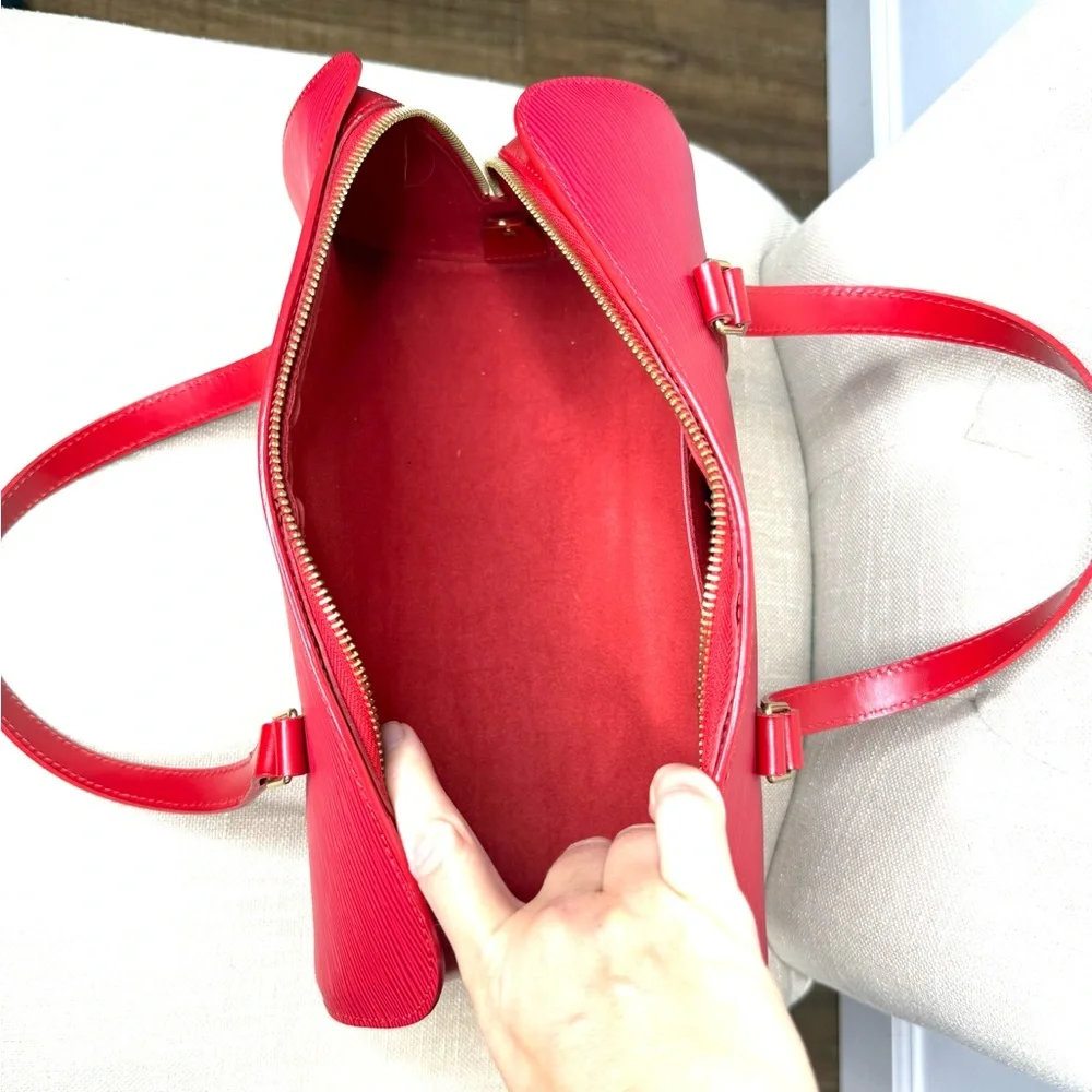 Authentic Louis Vuitton Soufflot bag M52227 red Epi leather with mini pouch